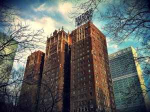 <img alt="Tudor City building and sign in New York City">