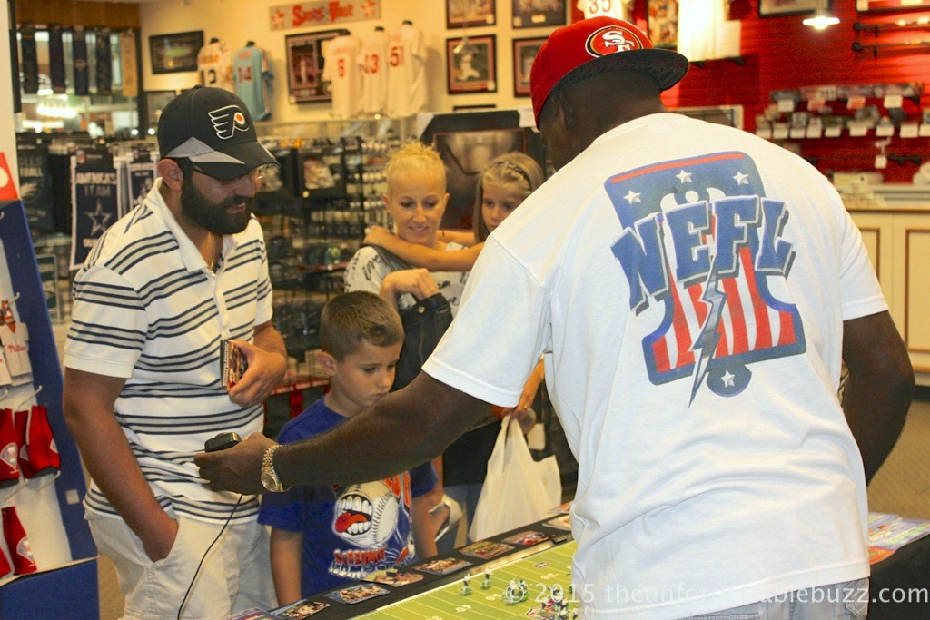 Corey introduces Electric Football to a boy whose never seen the game before.